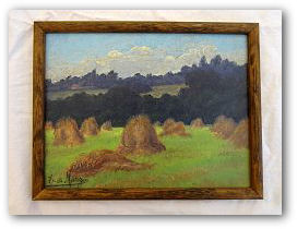 Haystacks in field by E.D. Marzo